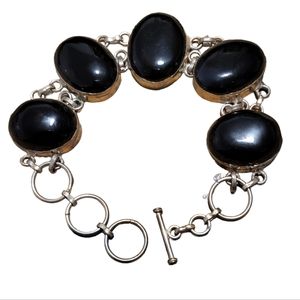 Beautiful silver plated oval black onyx stone bracelet